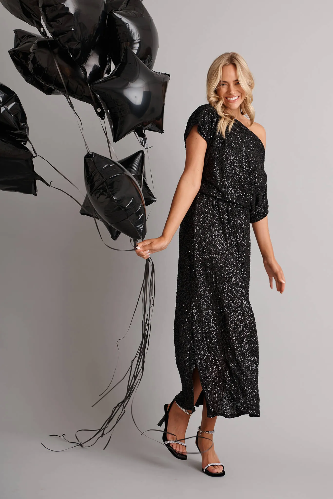 Amiri Off Shoulder Maxi Dress in Black Sequin