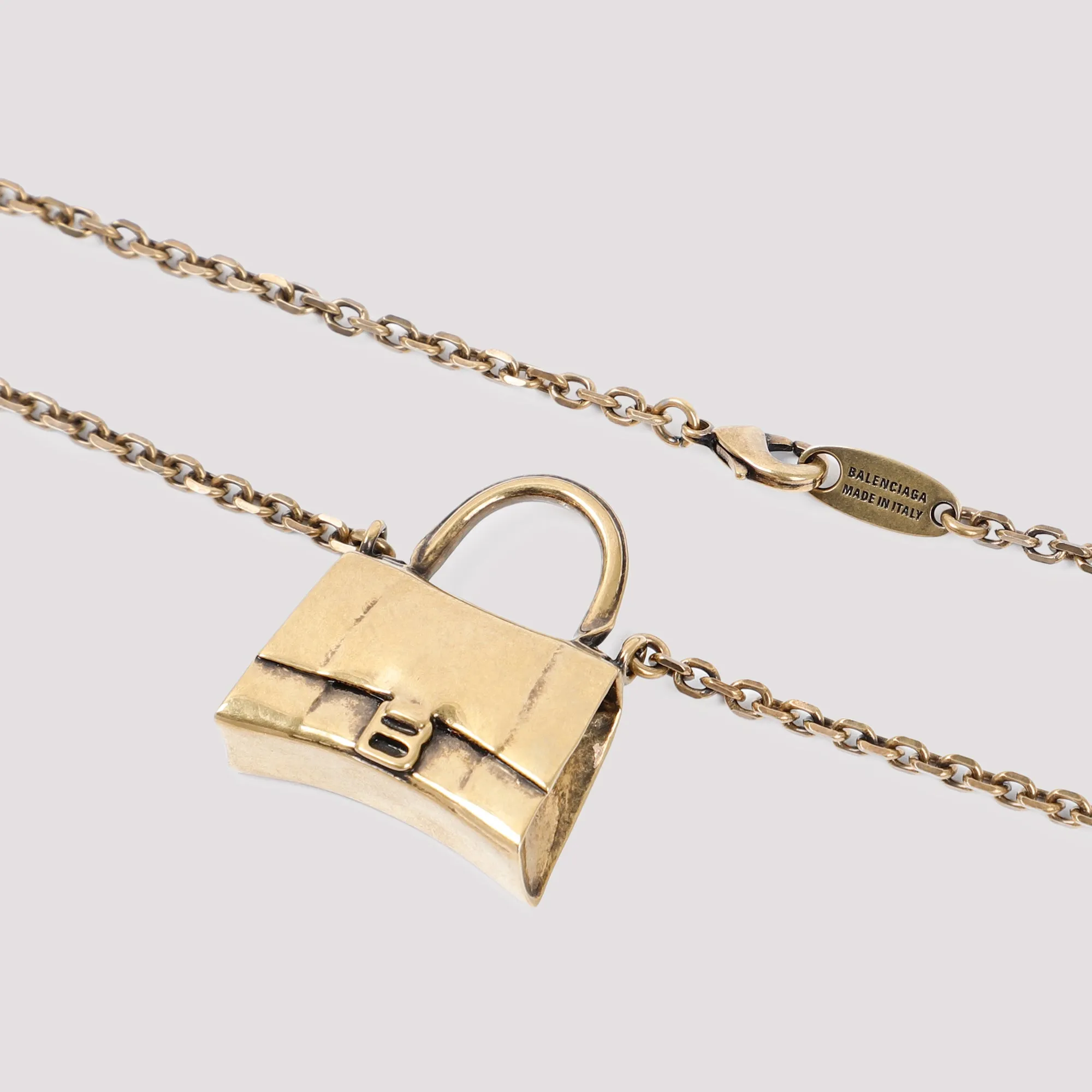 Hourglass Bag Pendant Necklace by Balenciaga