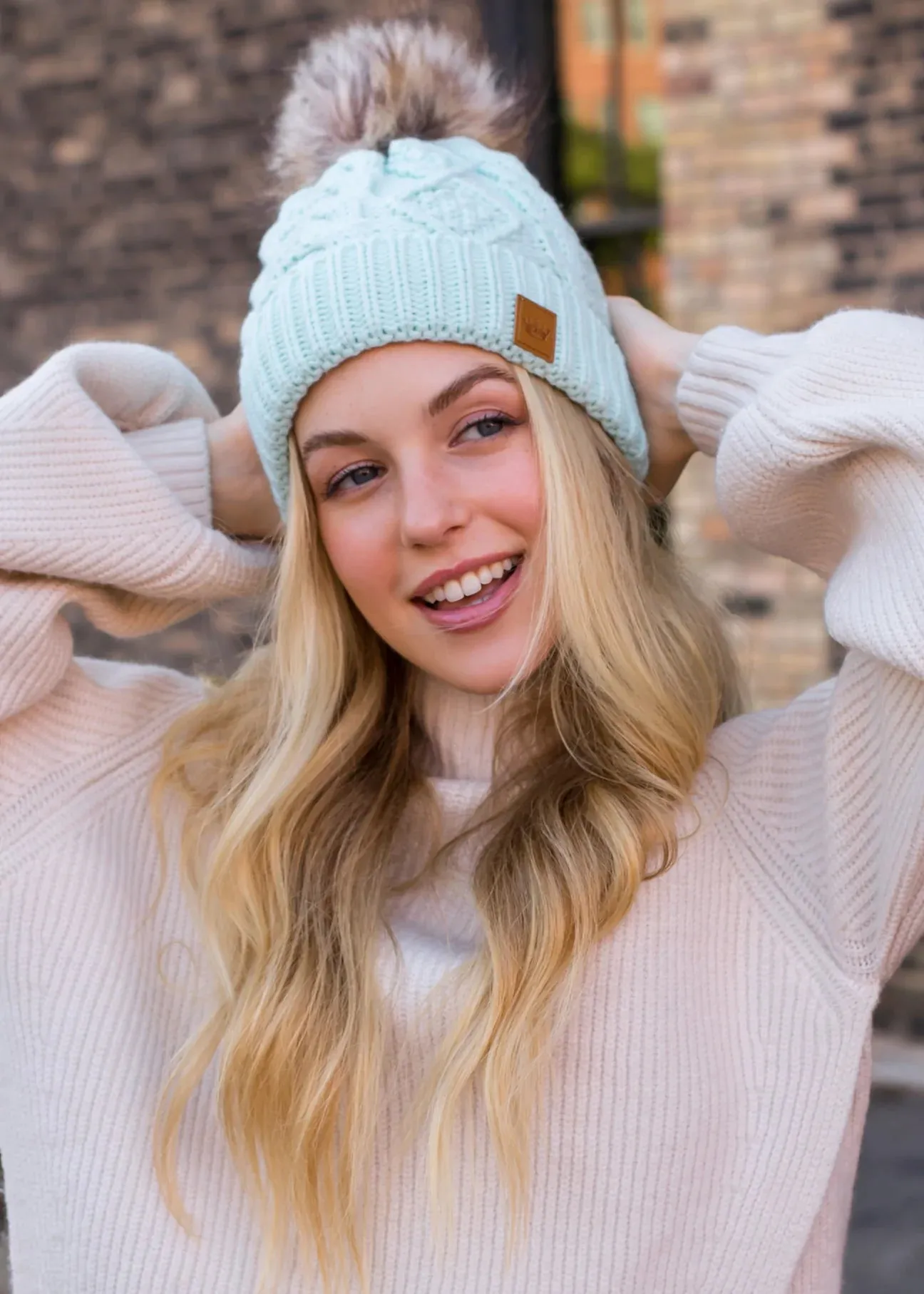 Cable Knit Hat with Faux Fur Pom