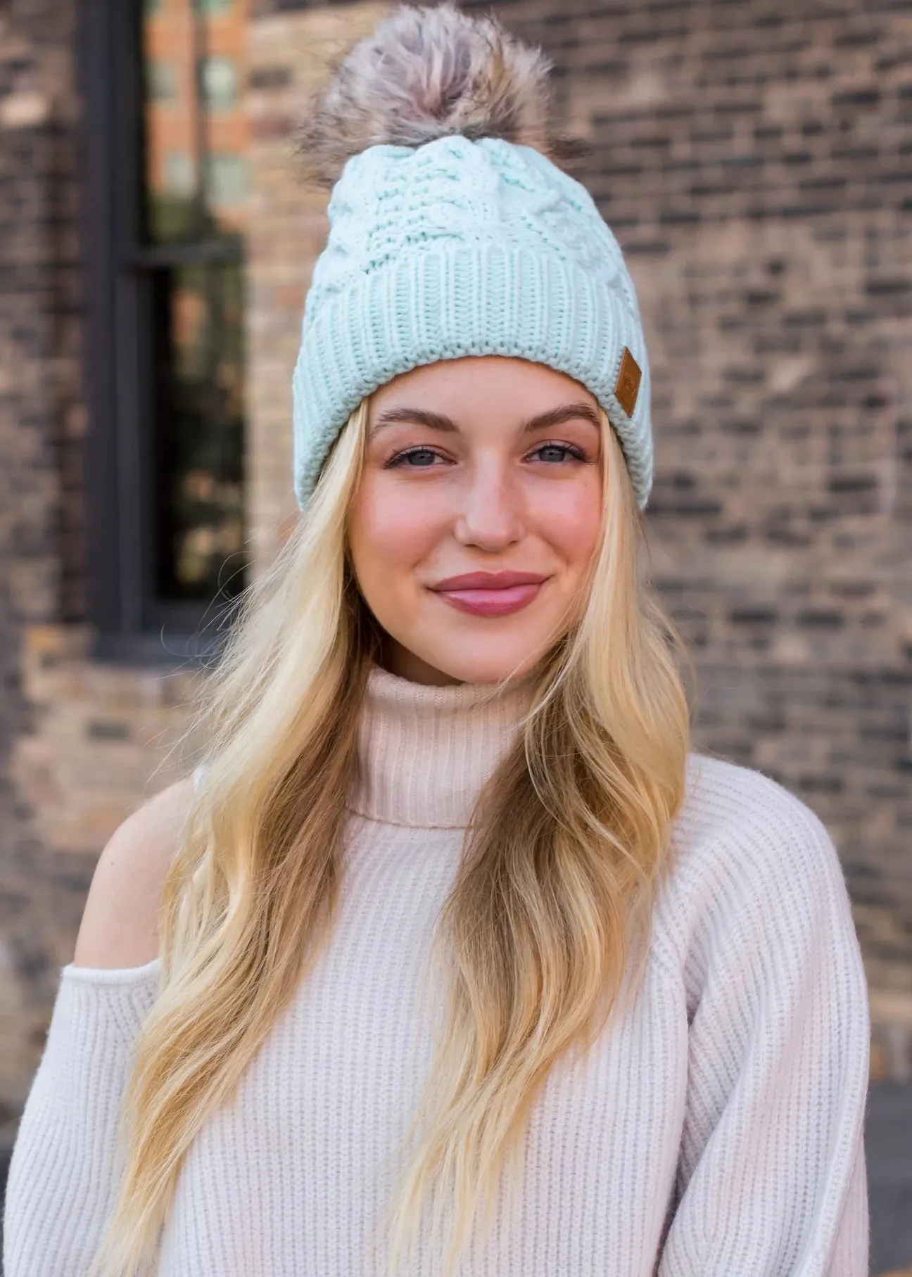 Cable Knit Hat with Faux Fur Pom