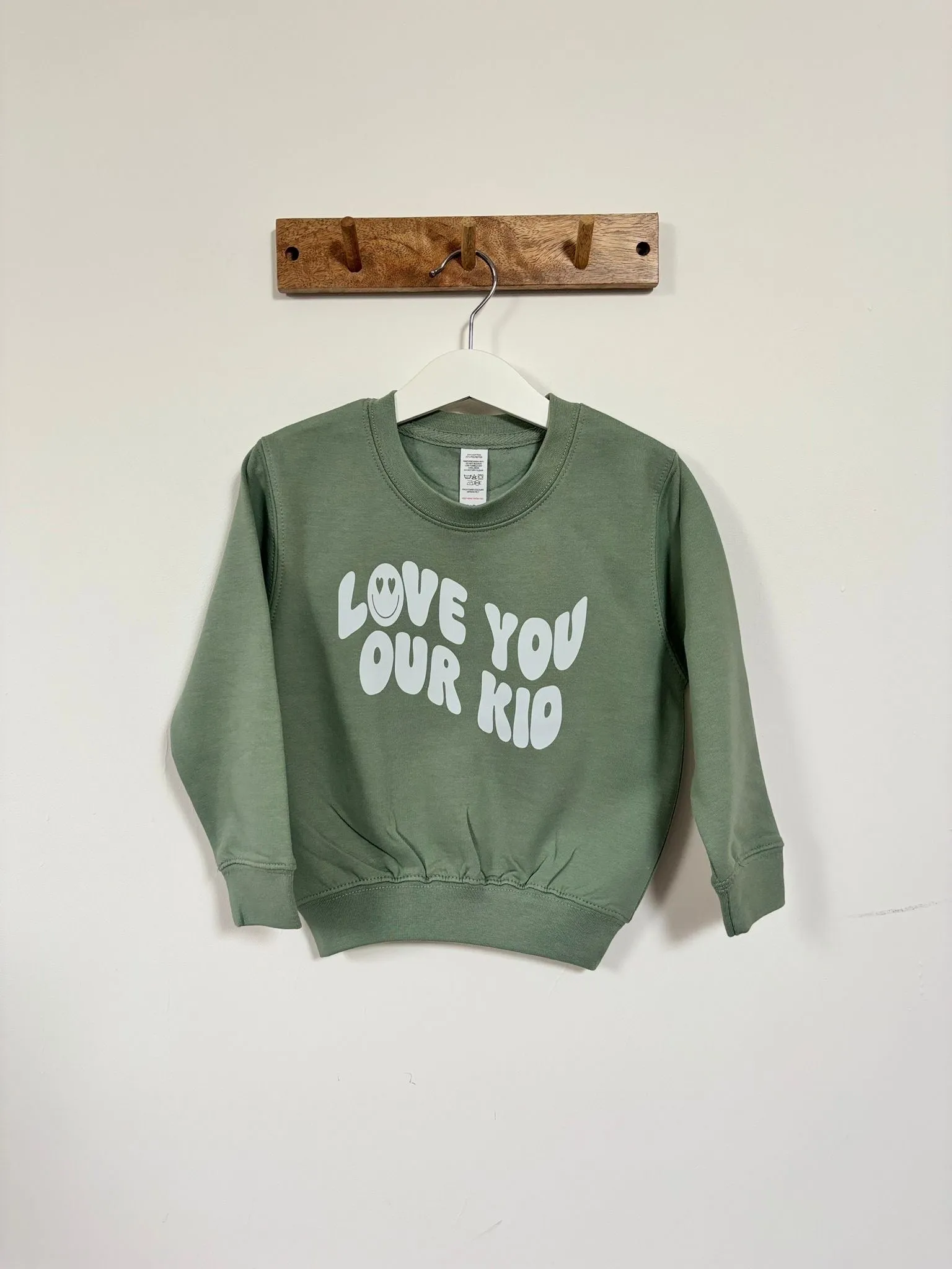 Our Albie ‘Love You Our Kid’ sweatshirt for kids in cool green