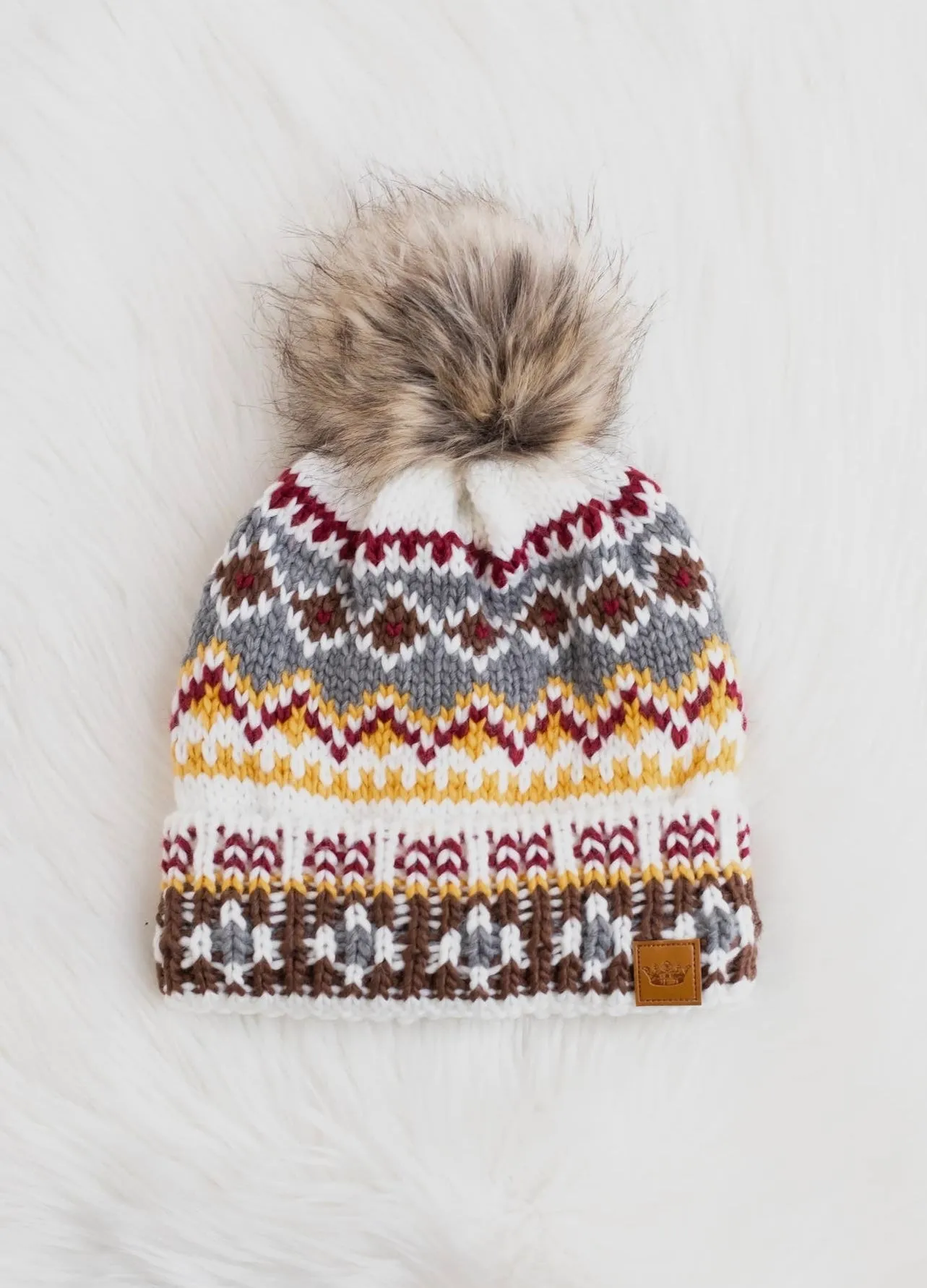 Patterned Knit Hat with Faux Fur Pom